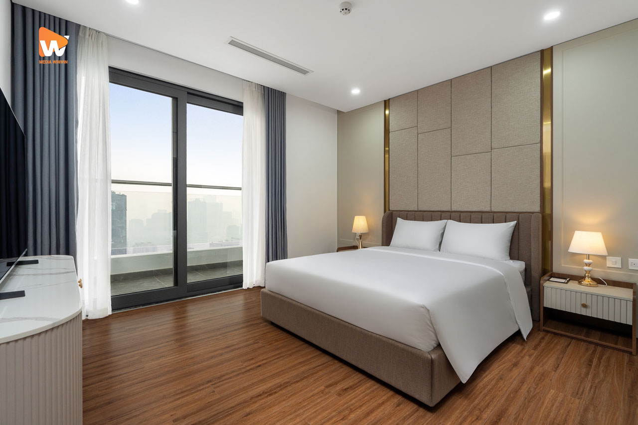 Chụp ảnh khách sạn Aravelle Suites — phòng ngủ trong căn suite