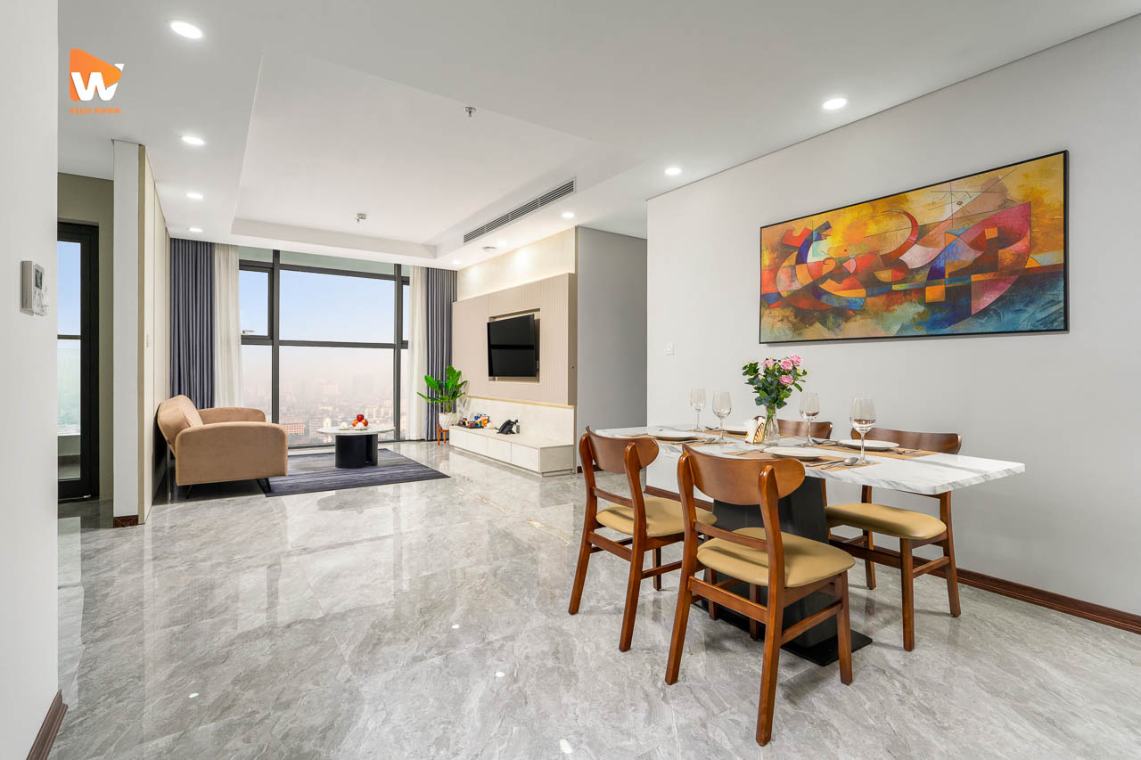 Chụp ảnh khách sạn Aravelle Suites — phòng khách kết hợp bàn ăn căn suite