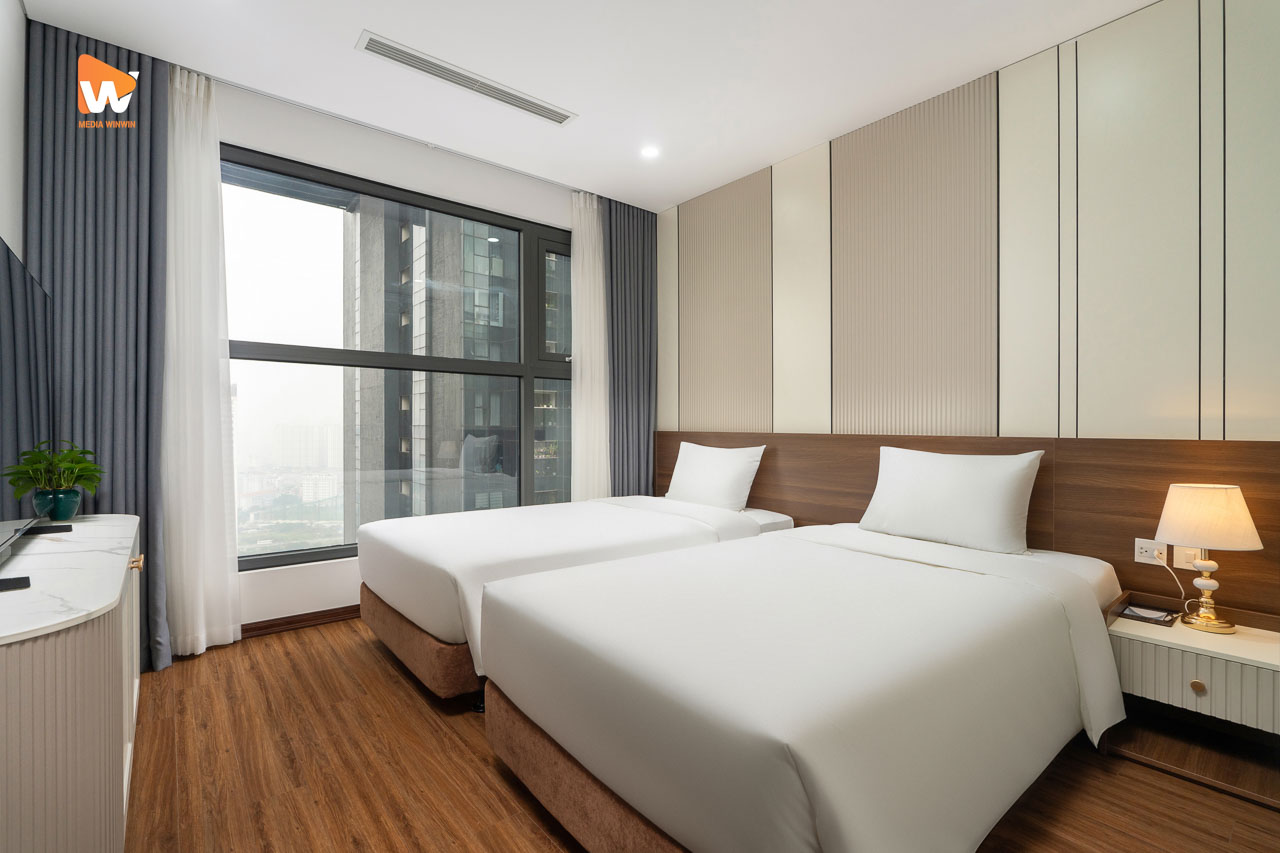 Chụp ảnh khách sạn Aravelle Suites — phòng ngủ hai giường căn suite