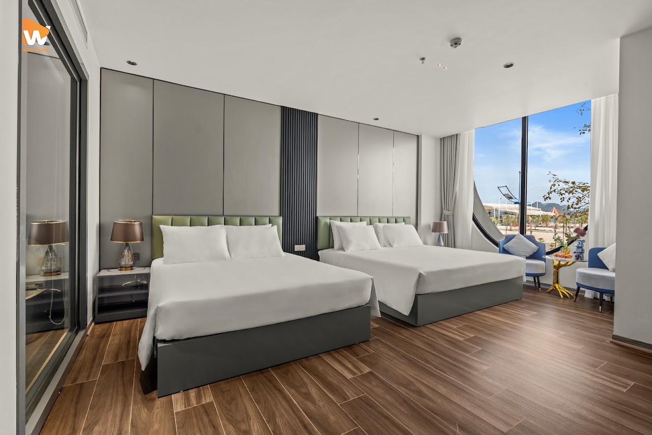 Chụp ảnh khách sạn Lavender Hotel Vân Đồn — phòng nghỉ tông trung tính