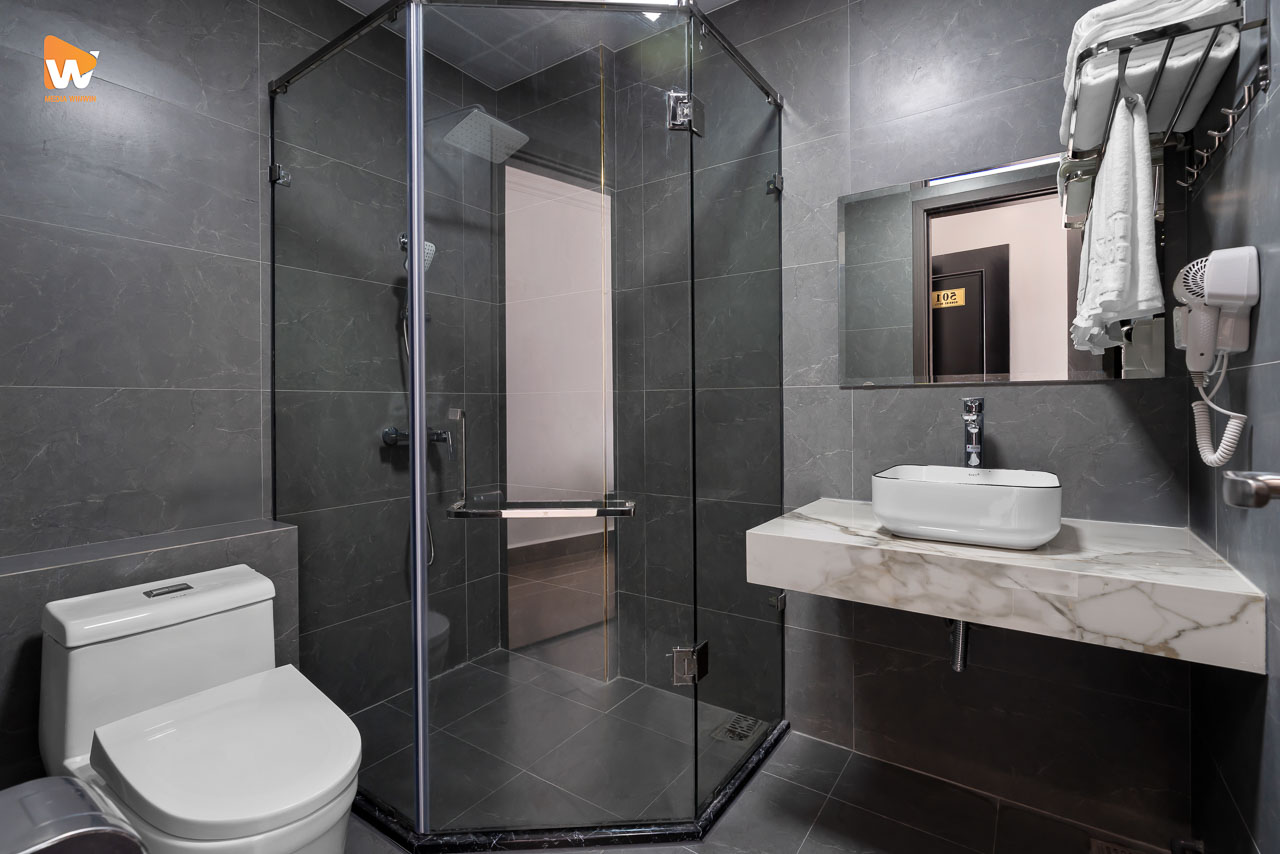 Chụp ảnh khách sạn Sunrise Hotel Vân Đồn — phòng tắm